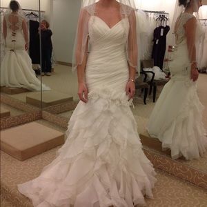 sweetheart neckline, beaded straps, and the back is unique.